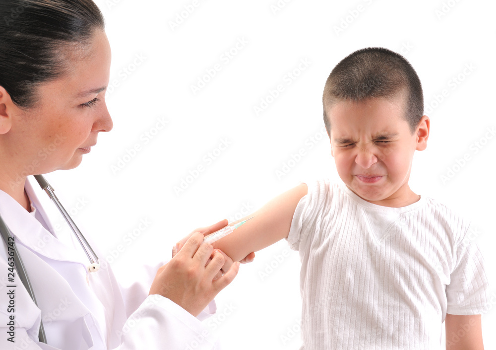 Doctor giving an injection in arm a mimmicking child. Doctor giving an injection in arm a mimmicking child.