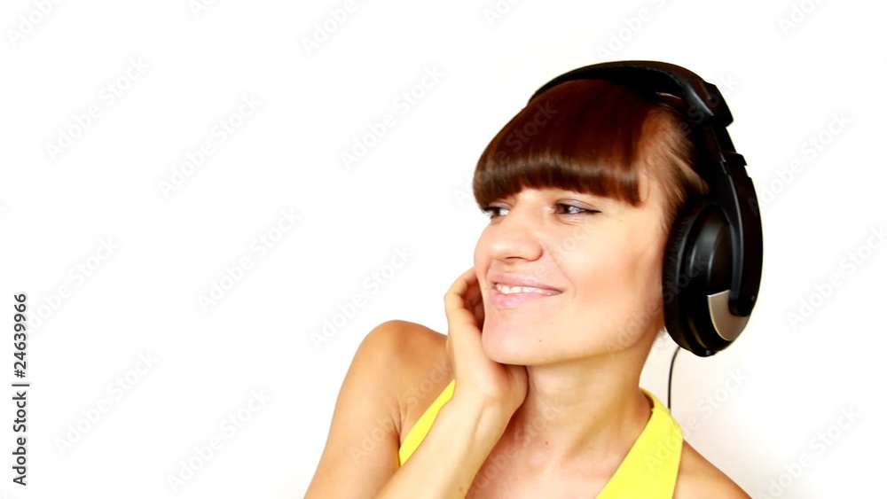 Attractive woman with headphones, isolated Attractive woman with headphones, isolated