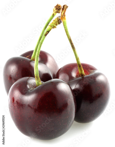 trois cerises, fond blanc photo