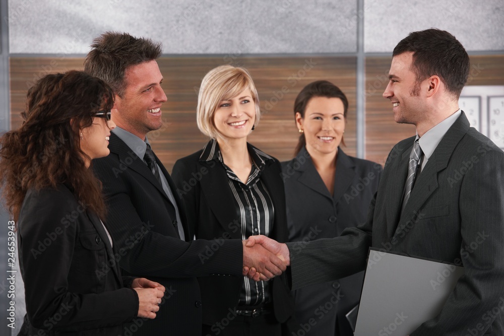 Business partners shaking hands Business partners shaking hands