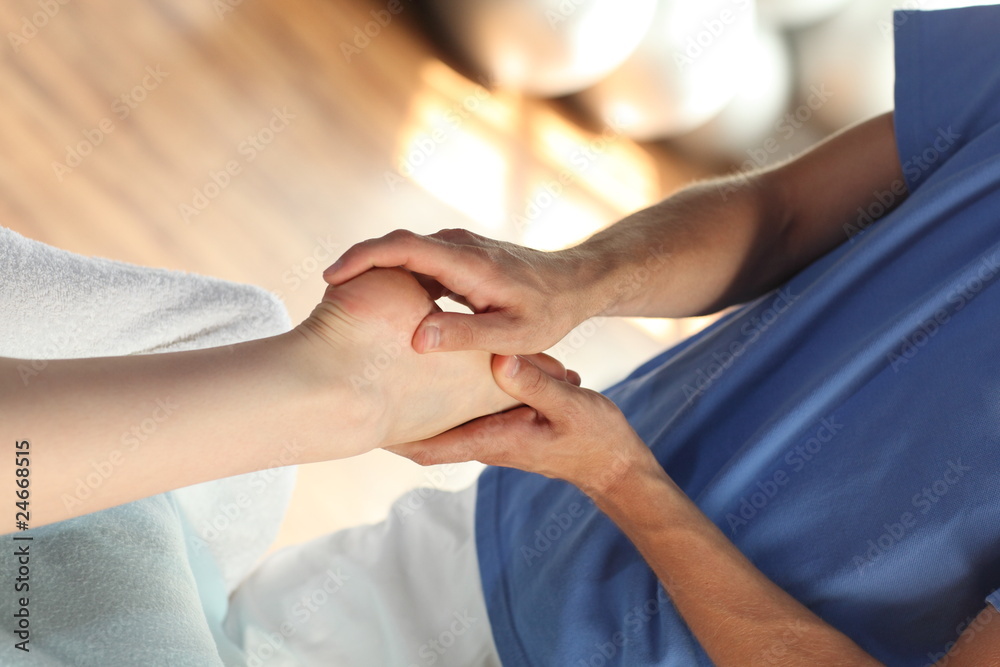 Fototapeta premium female foot massage - close up