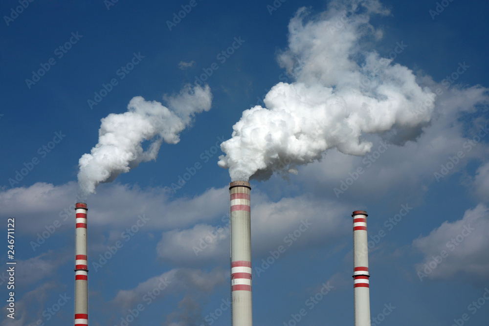 smoke from three coal power plant chimney