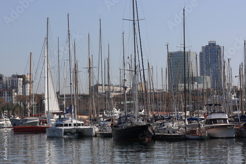 Many yachts in port of Barcelona © Arkady Chubykin