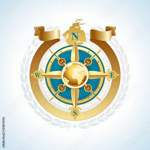 Golden compass rose with globe and ribbon