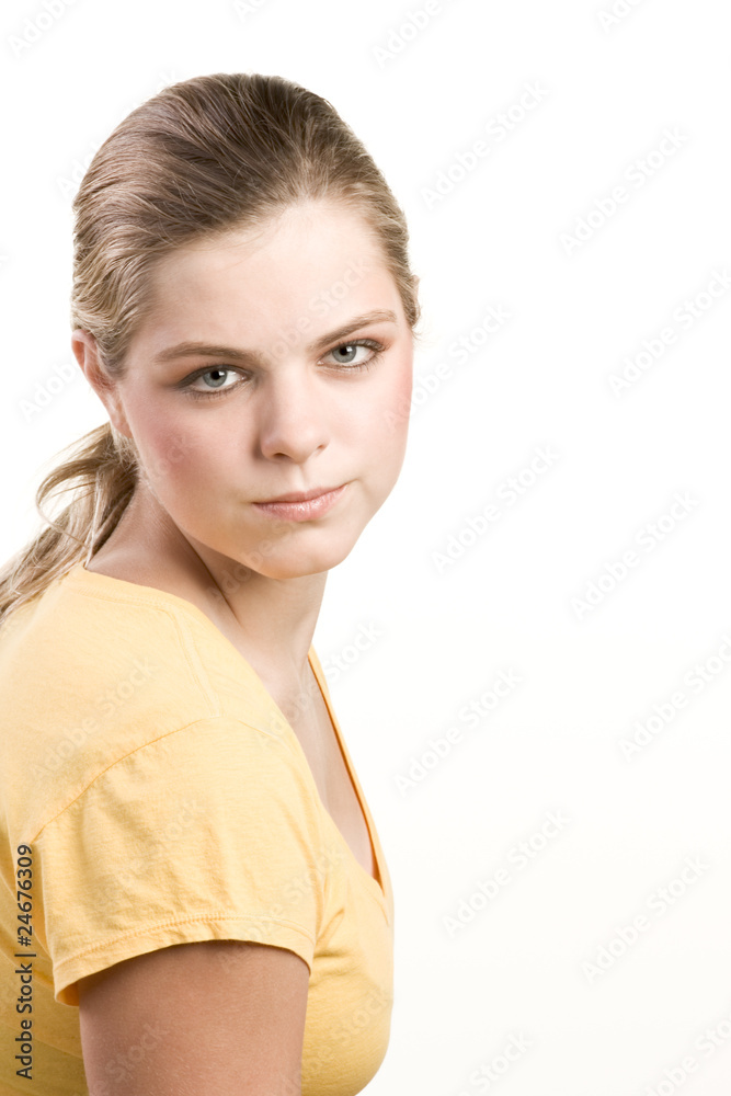 Headshot portrait of teenage girl in yellow blouse Headshot portrait of teenage girl in yellow blouse