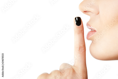 Female finger silence sign photo