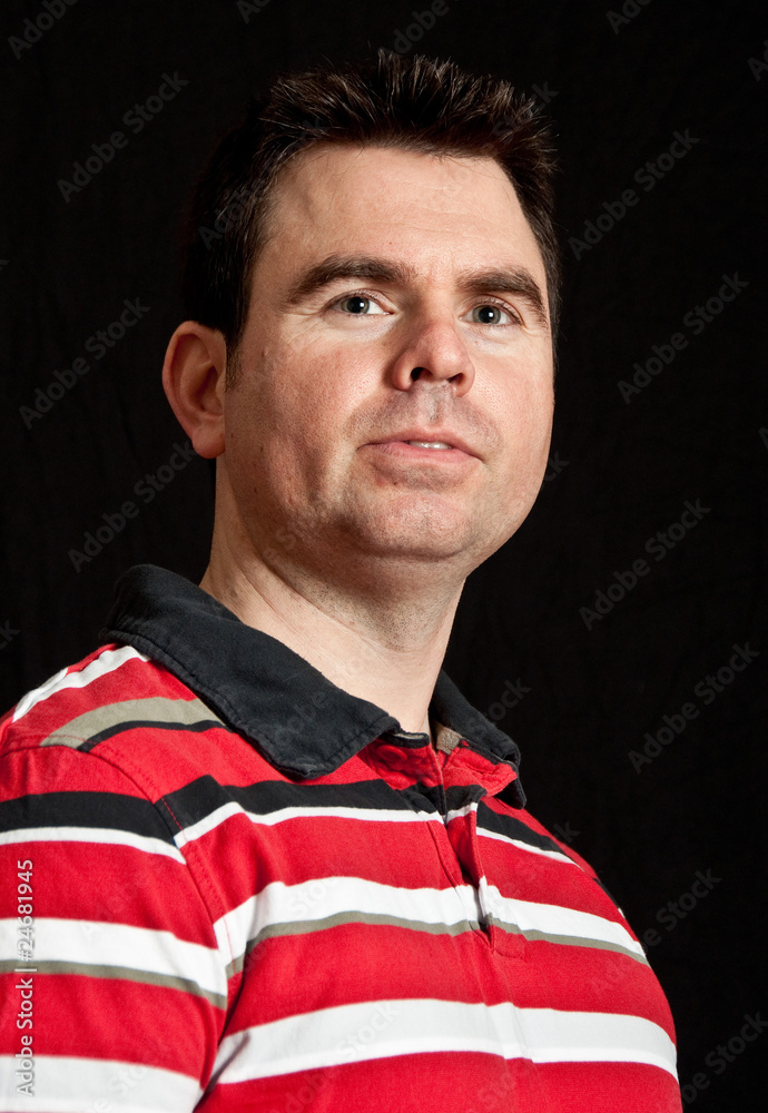 close up of male portrait on black backdrop close up of male portrait on black backdrop