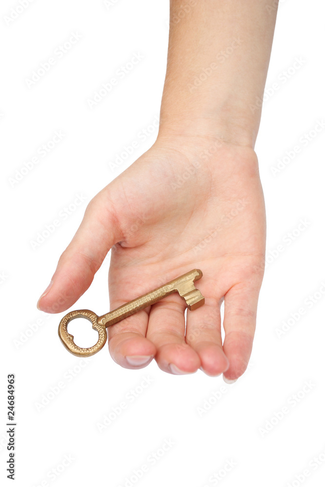 Hand with gold key
