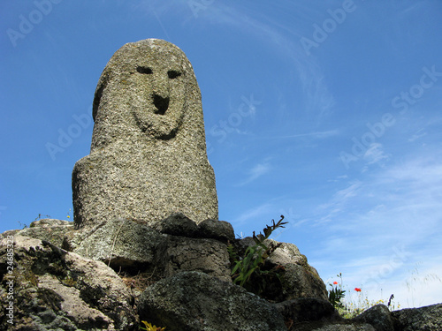 Statue of human in Park Filitosa in France, Corsica photo