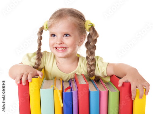Child holding pile of books. Isolated.
