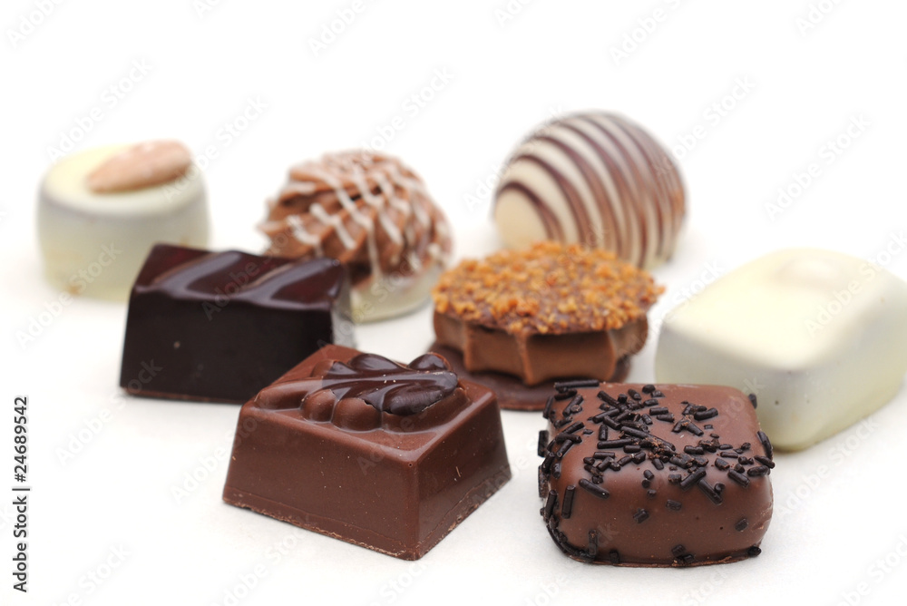 Belgian chocolates on white, shallow depth of field Belgian chocolates on white, shallow depth of field