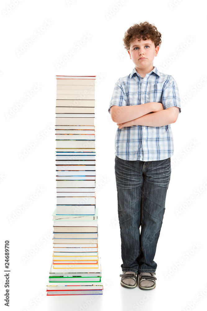 Student standing close to pile of books on white background Student standing close to pile of books on white background