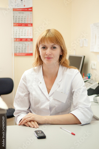 medical doctor with telephone