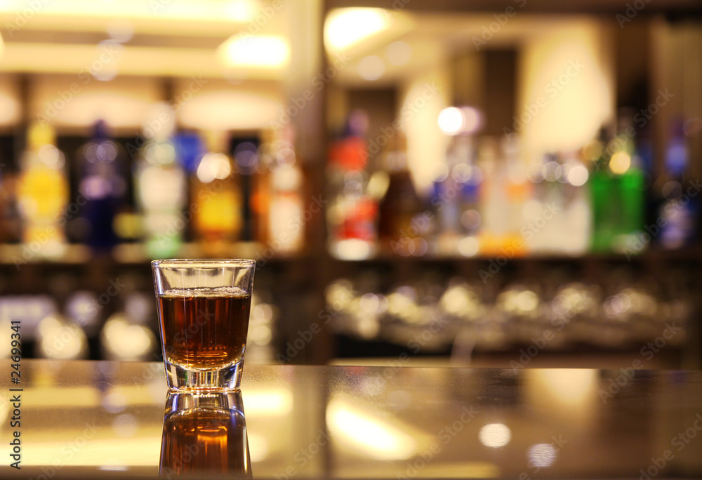 A shot of whiskey at bar