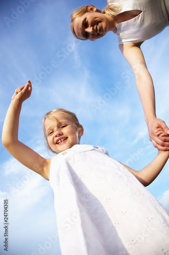 happy little girl and her mother