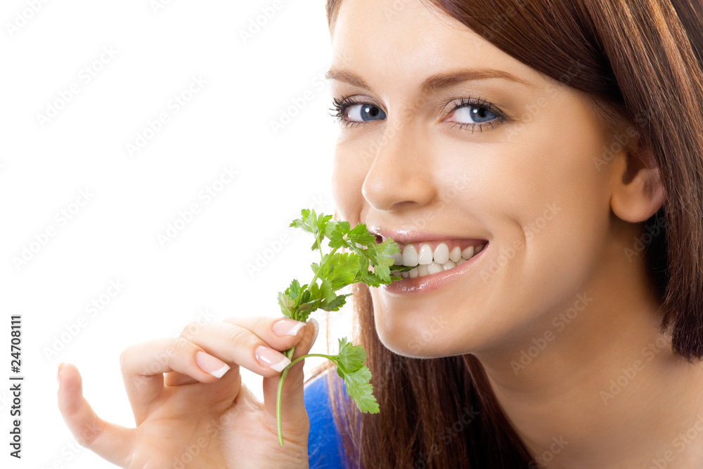 Young smiling woman with potherbs, isolated on white Young smiling woman with potherbs, isolated on white