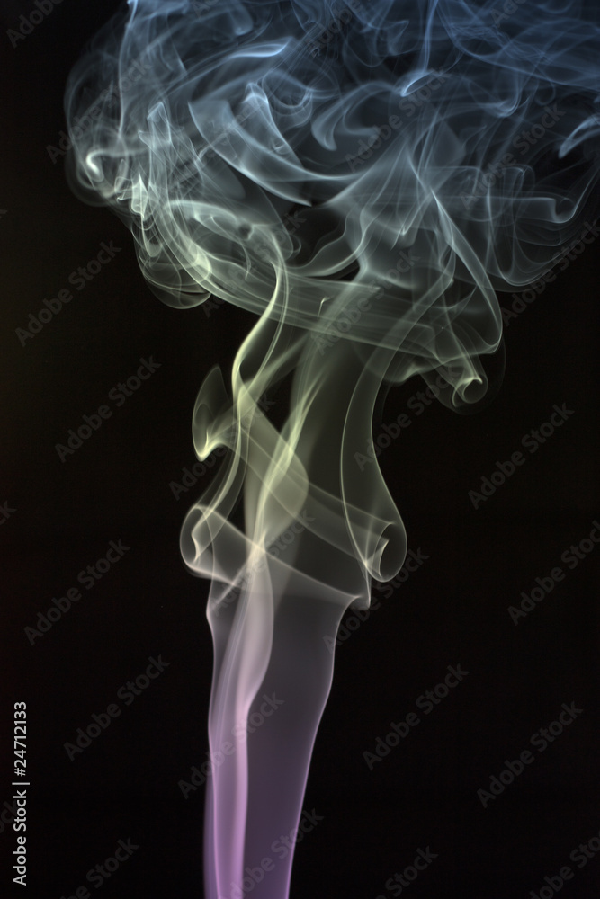 Colored smoke on black background Colored smoke on black background