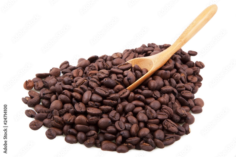 Fototapeta premium heap of coffee beans with wood spoon isolated on white