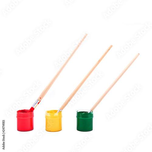 color oil paint bottles with brushes isolated on white