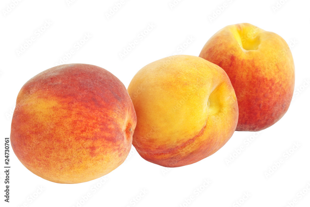 Closeup of three peaches isolated on white Closeup of three peaches isolated on white