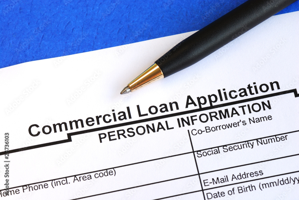 Complete the commercial loan application isolated on blue