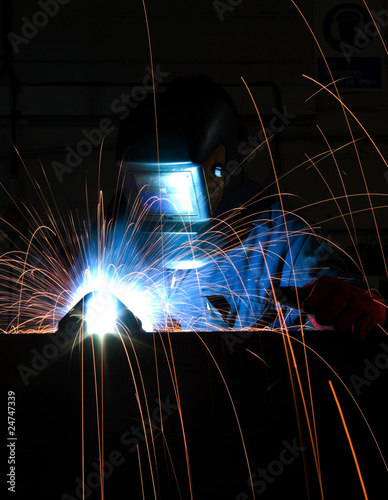 Welder making box section from steel