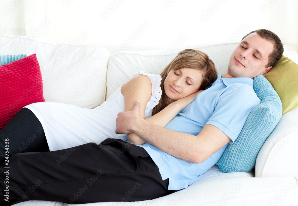 Relaxed couple sleeping on the sofa Relaxed couple sleeping on the sofa