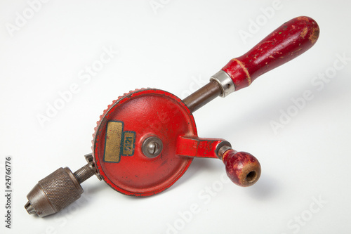 Red old-fashioned hand drill