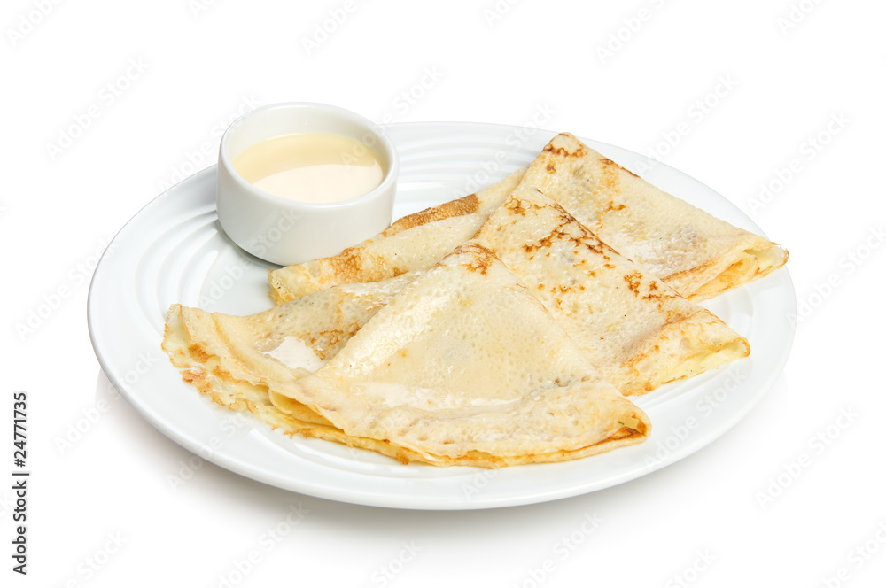 Russian pancakes with sweet condensed milk