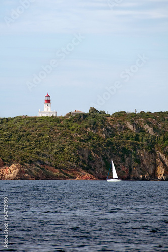 yacht sailing near La Chiappa lighthouse, Corsica