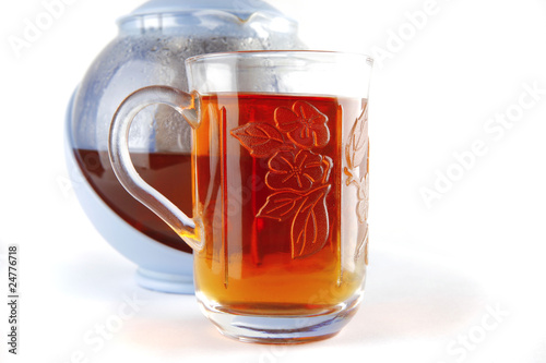 tea in glass and kettle