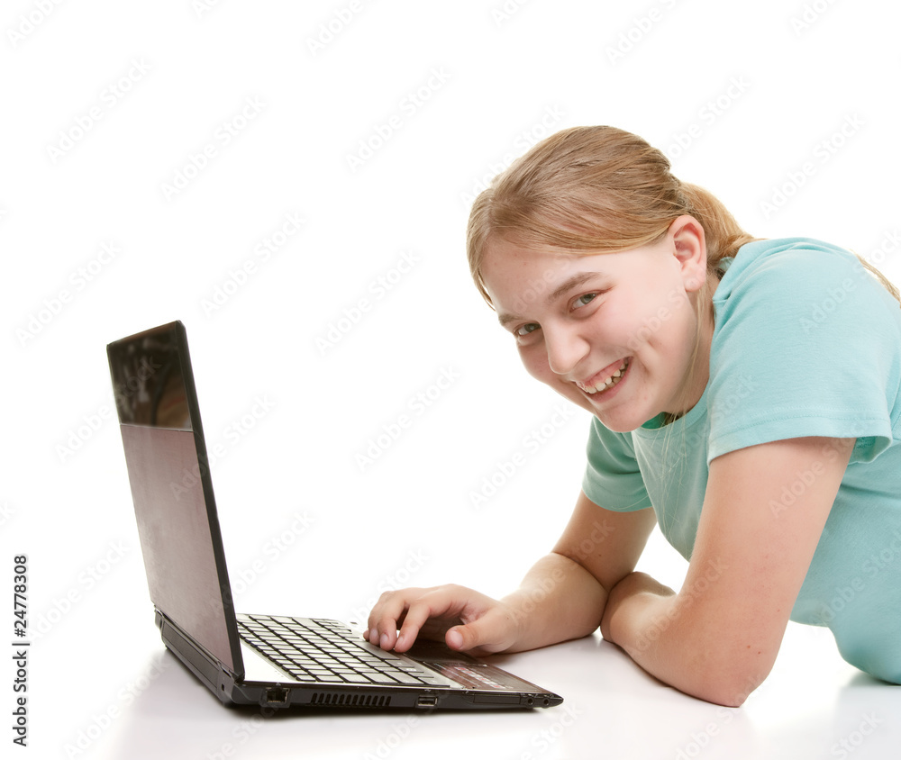 teenager using a notebook teenager using a notebook