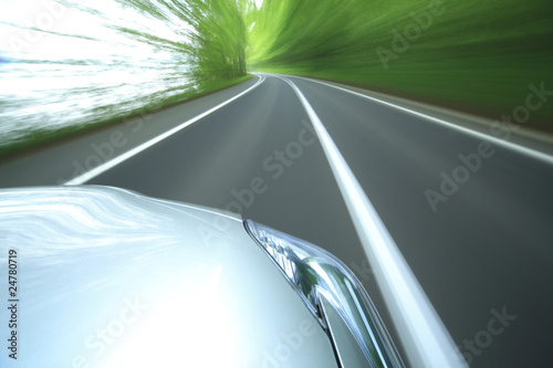 car driving fast into forest © MP_P