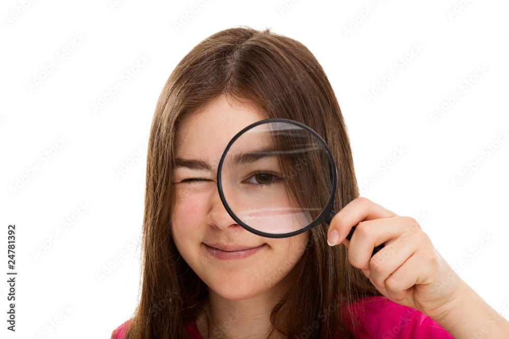 Girl holding magnifying glass isolated on white Girl holding magnifying glass isolated on white
