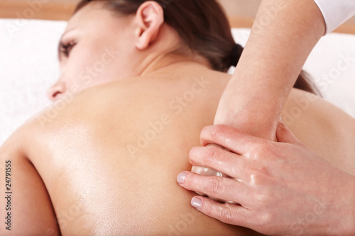 Girl having back massage.