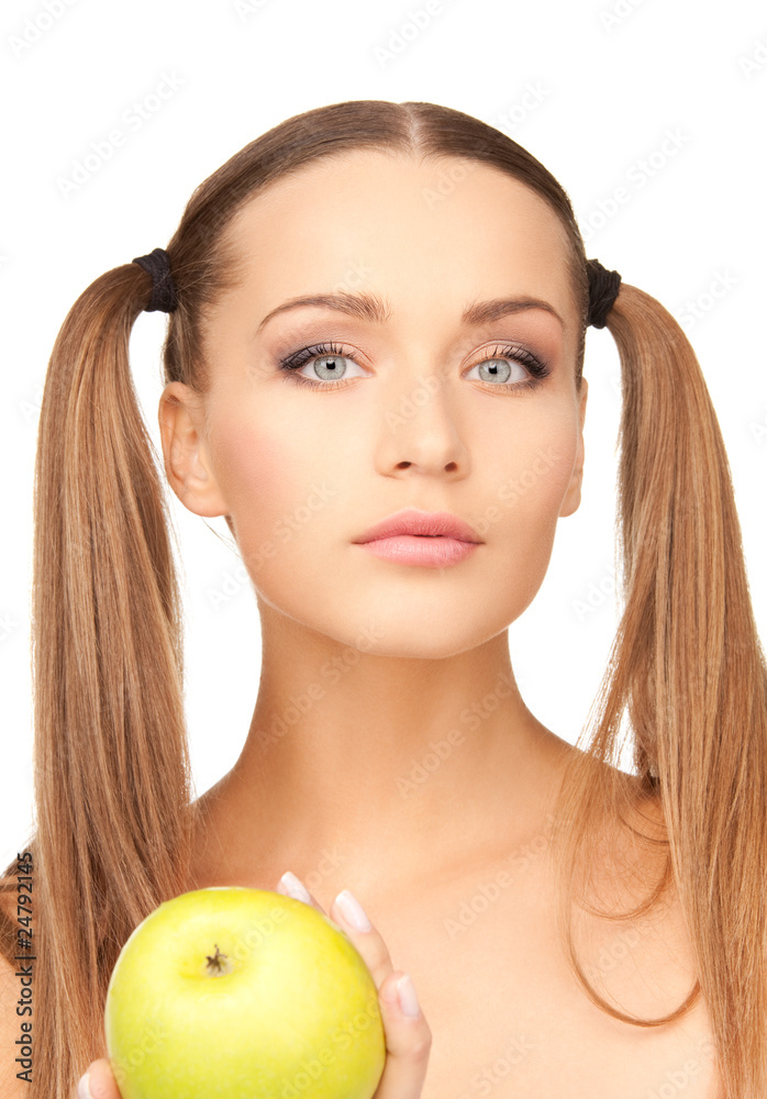 young beautiful woman with green apple young beautiful woman with green apple