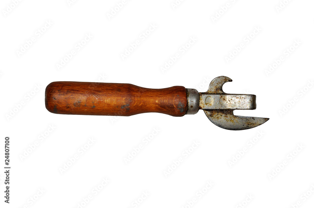 Old dirty, rusty can opener with wood handle isolated Old dirty, rusty can opener with wood handle isolated