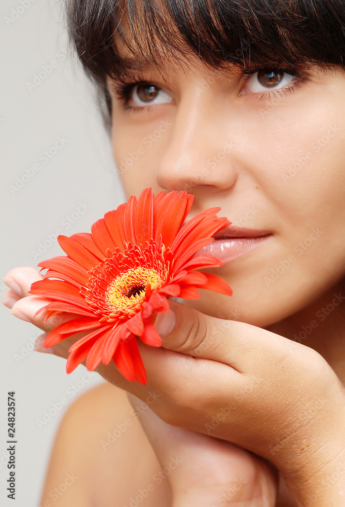 Young beautiful woman with flower Young beautiful woman with flower
