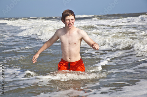 boy enjoying the beautiful ocean and beach