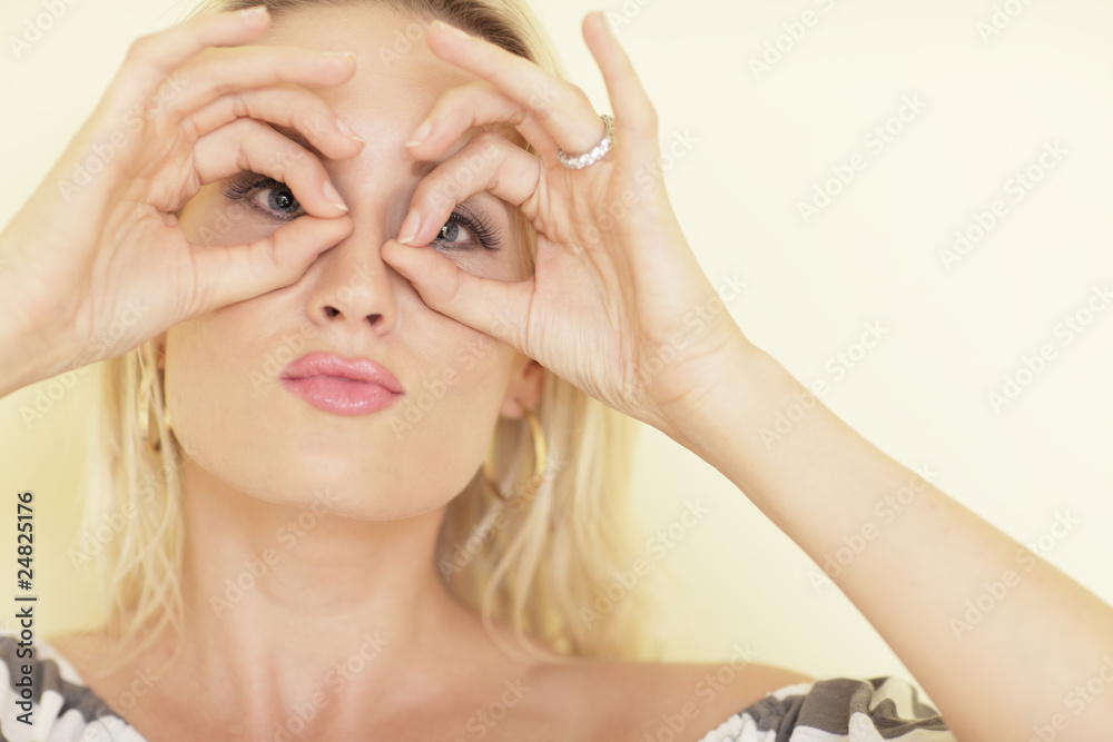 Fototapeta premium Woman making circles over her eyes