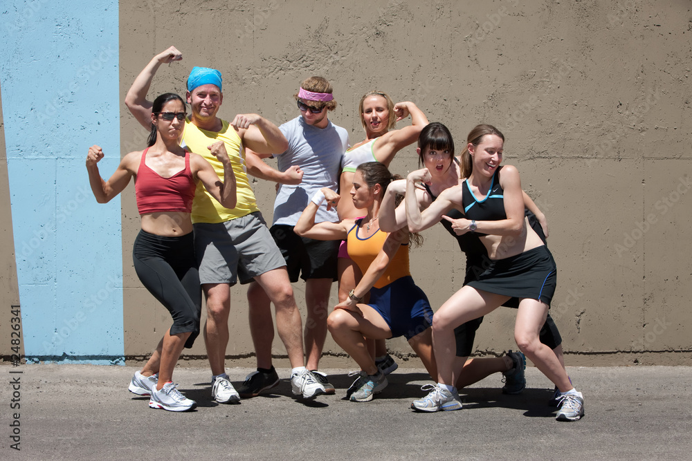 Runners pose for muscle shot