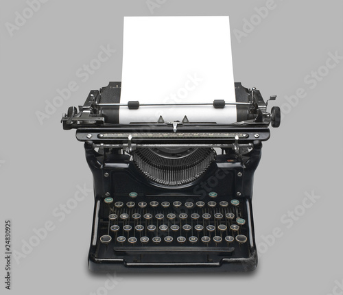 Vintage typewriter and paper, isolated