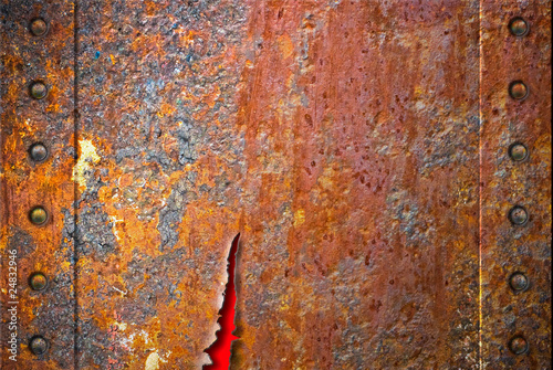 Torn rusty metal texture wi...