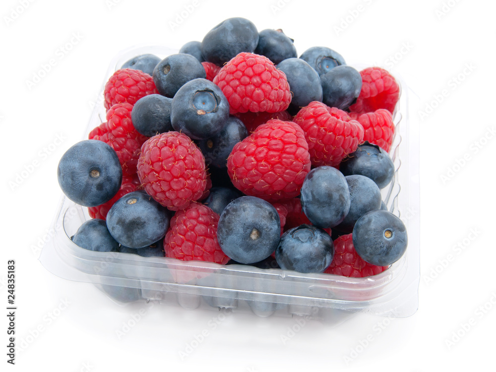 transparent basket with a raspberry and a blueberry transparent basket with a raspberry and a blueberry