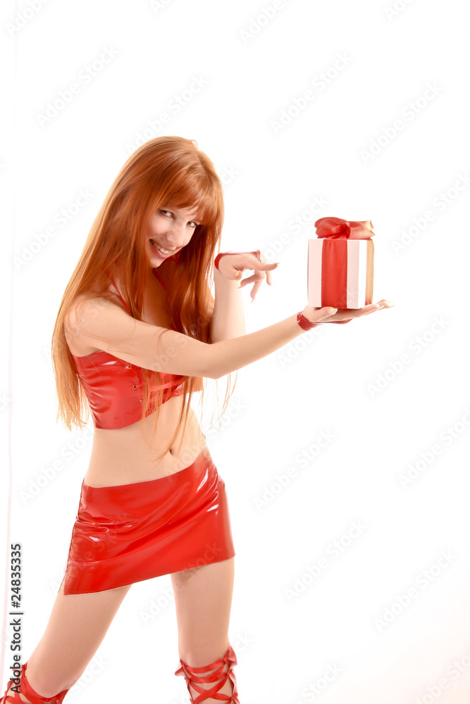 Beautiful redhead woman with present in hands isolated on white Beautiful redhead woman with present in hands isolated on white