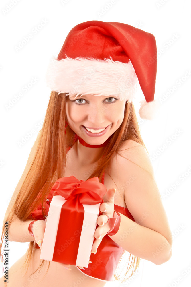 Beautiful redhead woman with Christmas present in hands isolated Beautiful redhead woman with Christmas present in hands isolated