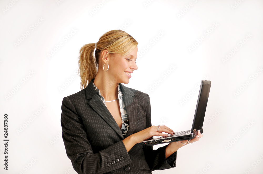 Blonde businesswoman in black two-piece suit with notebook Blonde businesswoman in black two-piece suit with notebook