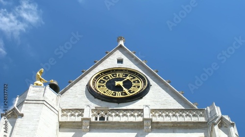 Time lapse clock at church tower in Leuven, Belgium