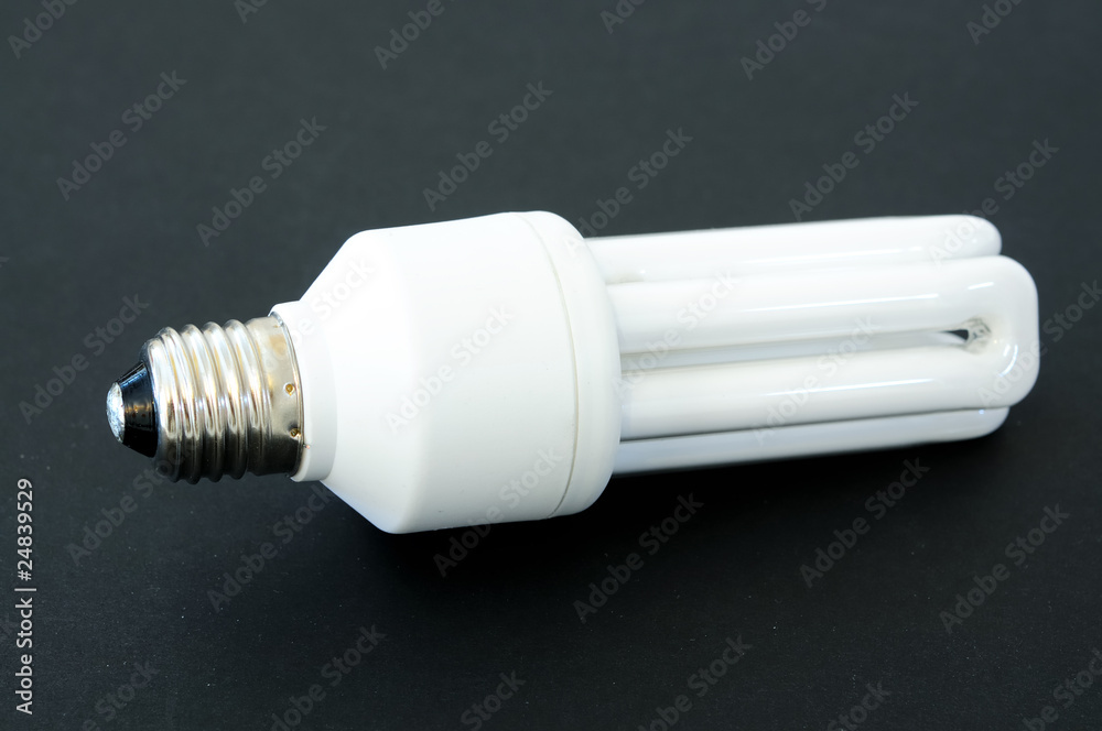 light bulb on dark black background light bulb on dark black background
