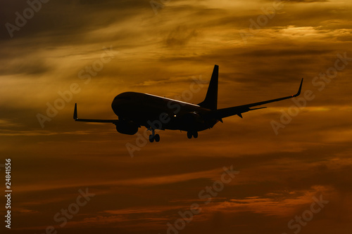 plane flying and sunset